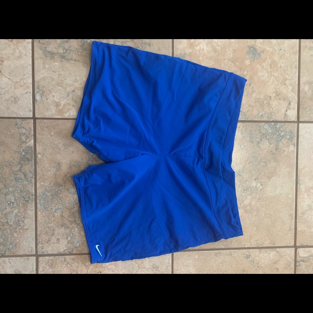 Blue Nike athletes shorts.